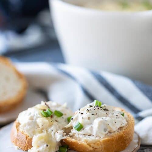 crab artichoke dip on gluten free crostini