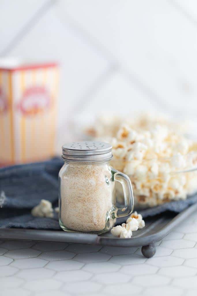 shaker filled with caramel popcorn seasoning