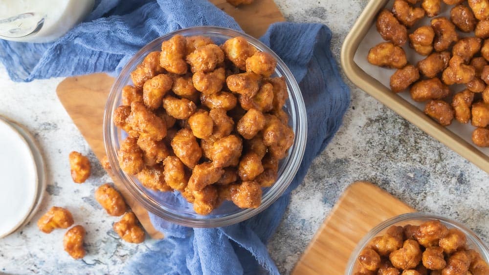 top down view of caramel puff corn in bowls