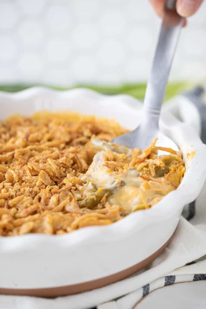 cheesy green casserole in dish