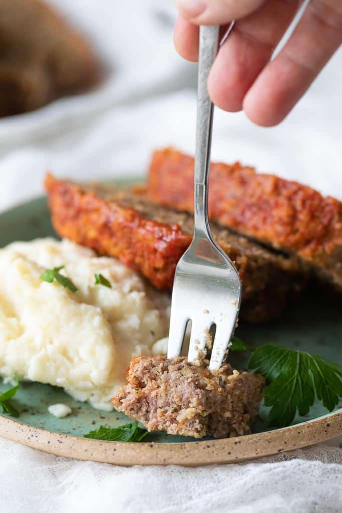 fork scooping bite of meatloaf