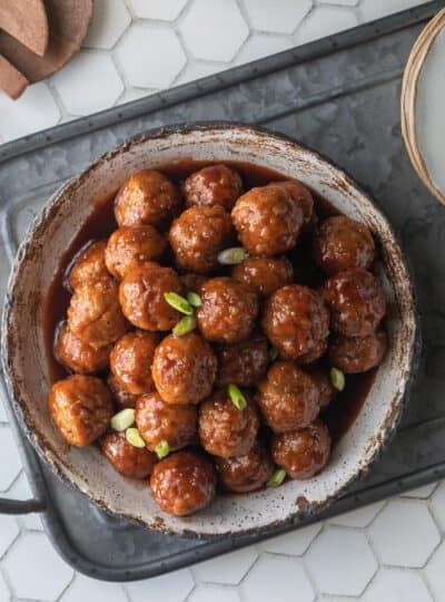 top down view of meatballs coated with sauce