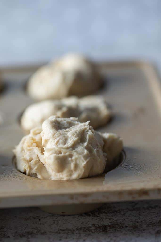 gluten free roll dough in muffin tin