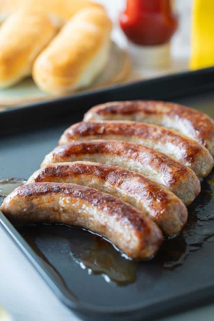 cooked brats on air fryer tray