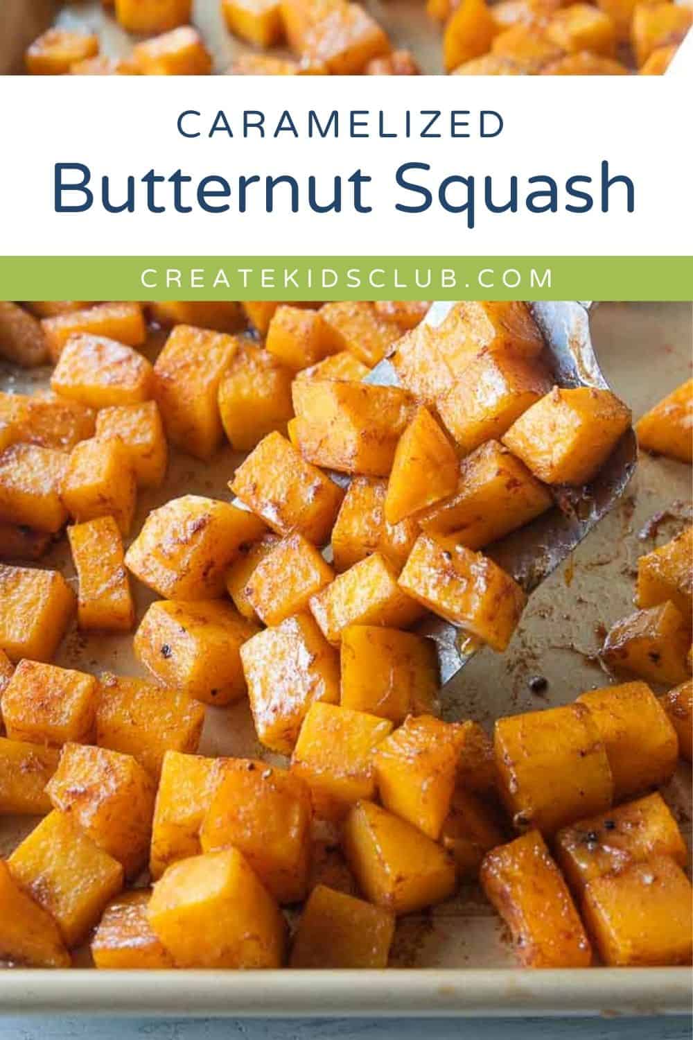 A pin of caramelized butternut squash on a baking sheet.