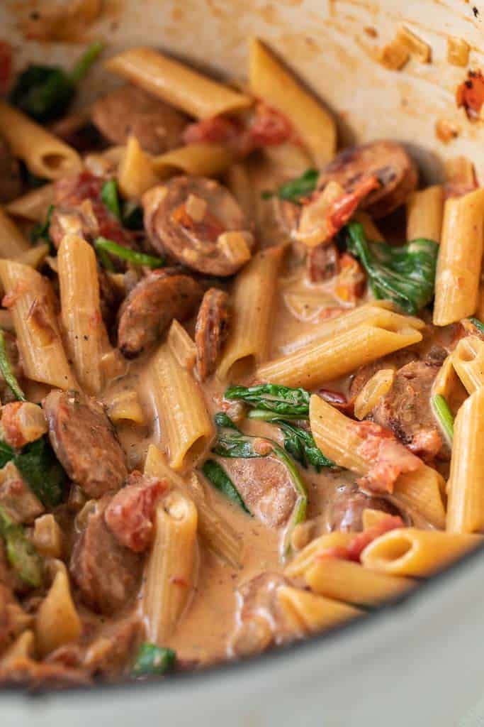 creamy chicken sausage pasta in pot