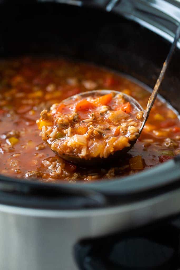 ladle in crockpot with stuffed pepper soup