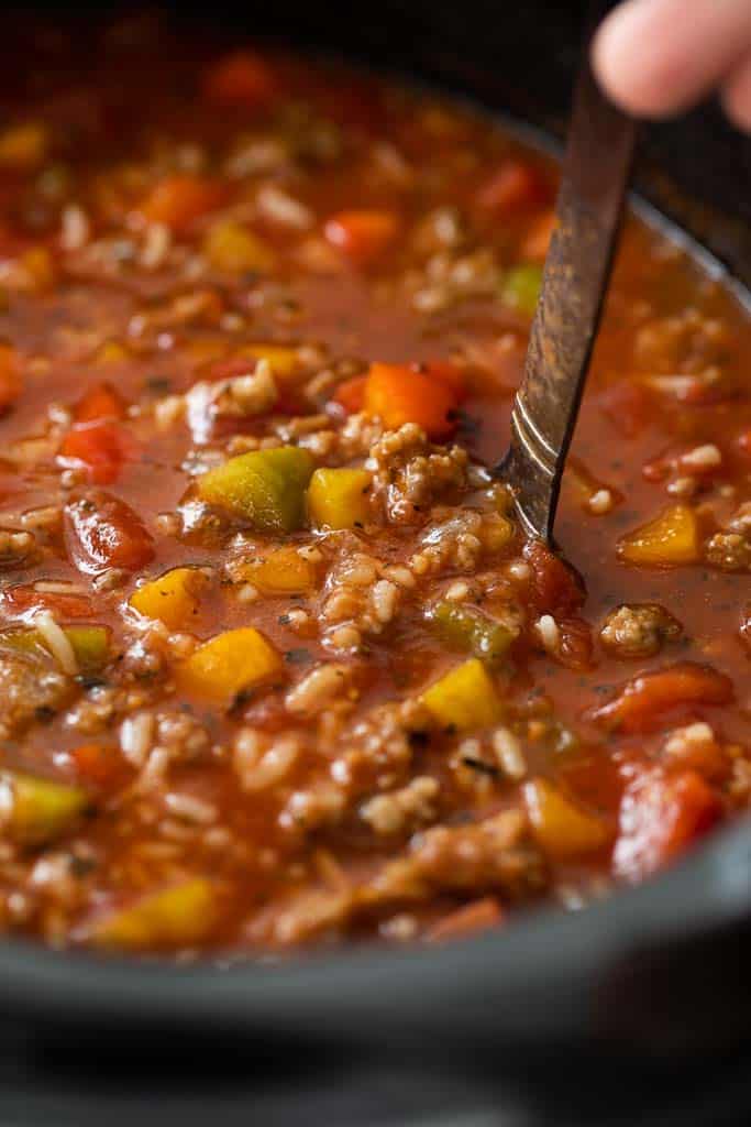 ladle in crockpot with stuffed pepper soup