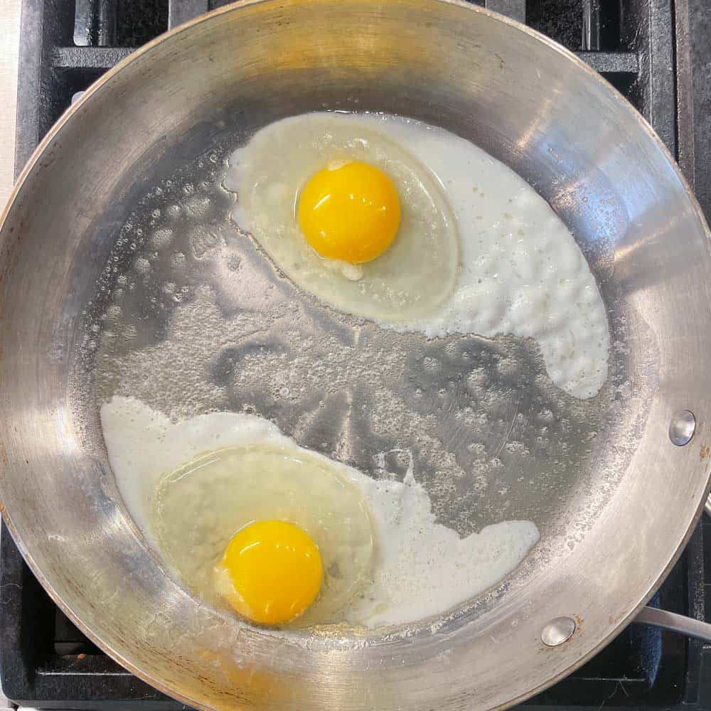 eggs cooking in saute pan