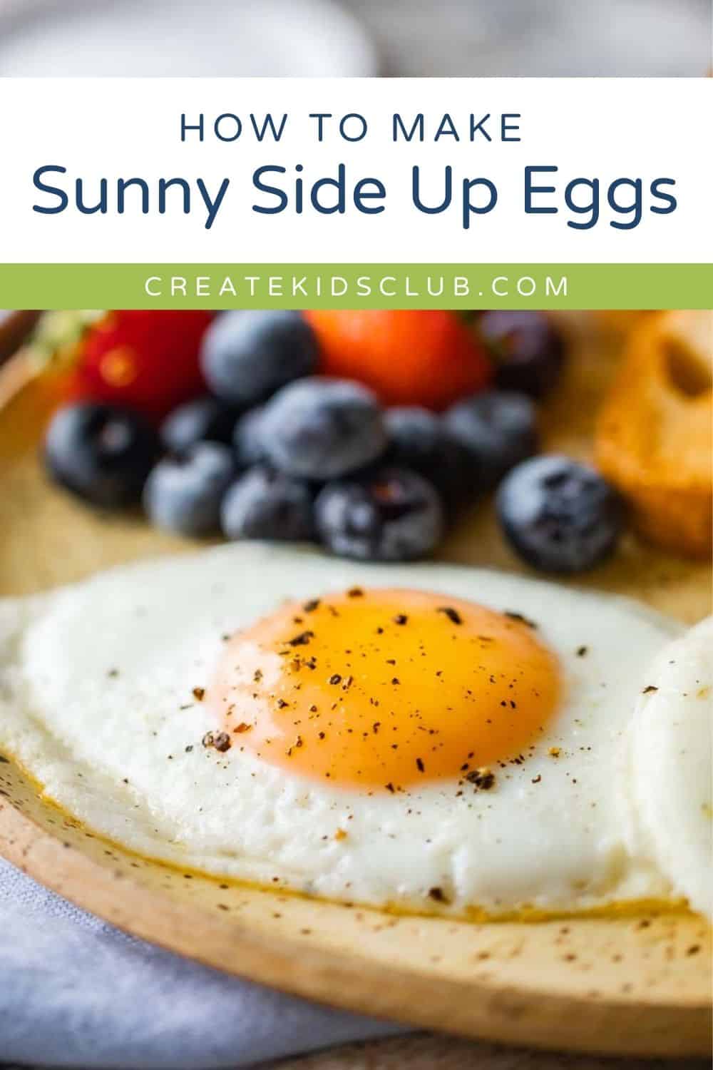 Pin of a sunny side up egg with fruit