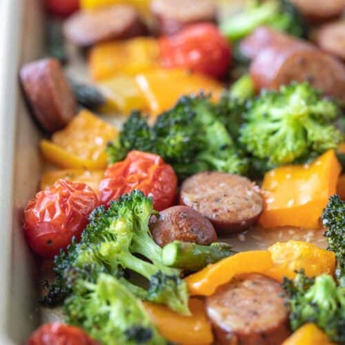 roasted vegetables and sausage on sheet pan