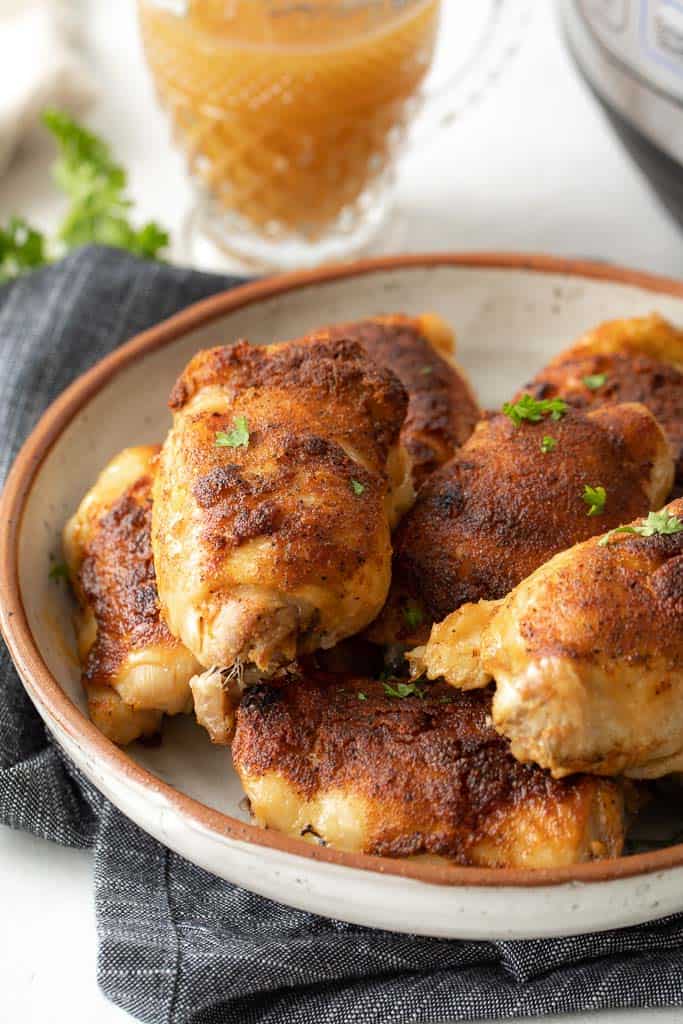 crispy chicken thighs in bowl