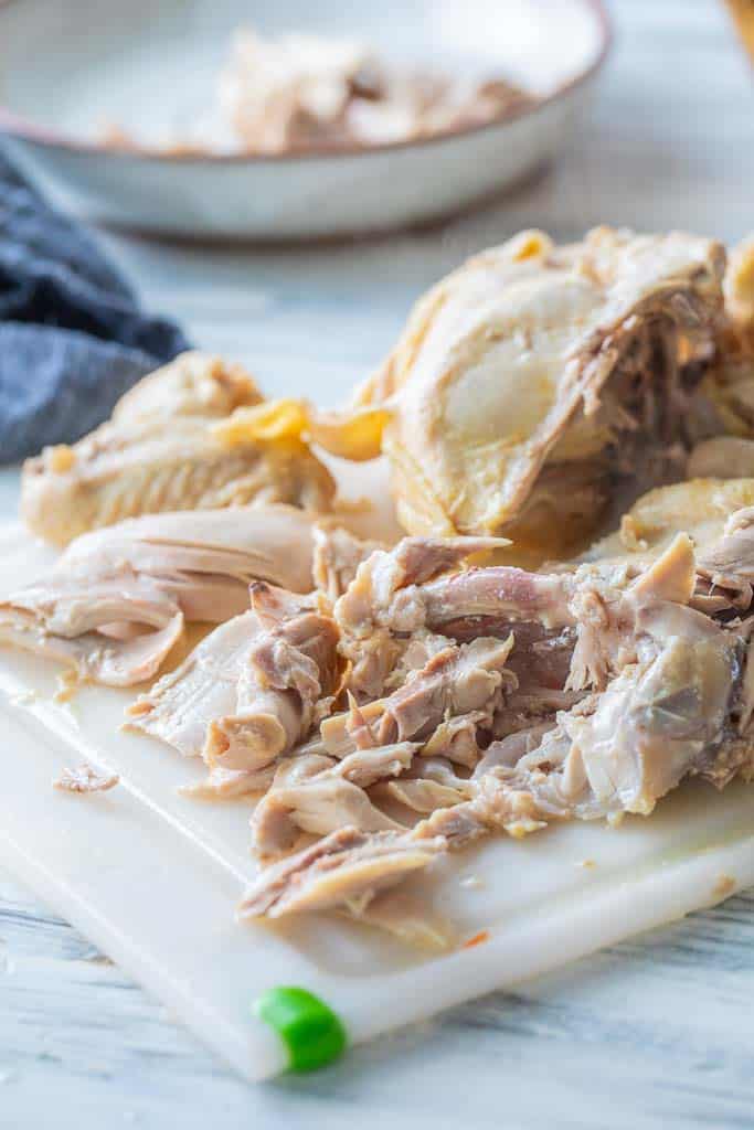 pulled chicken on a cutting board