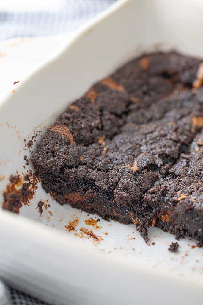 baking dish shown with chocolate caramel cake