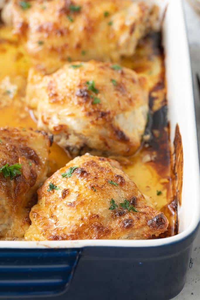 baked chicken thighs in a baking dish