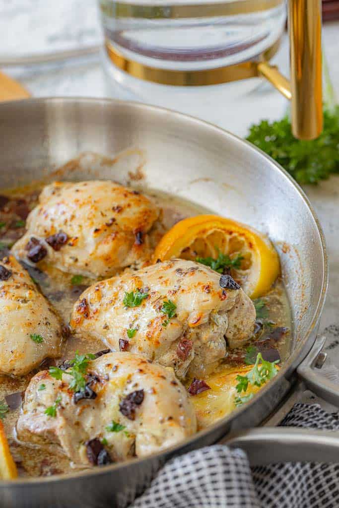 seasoned chicken thighs in skillet