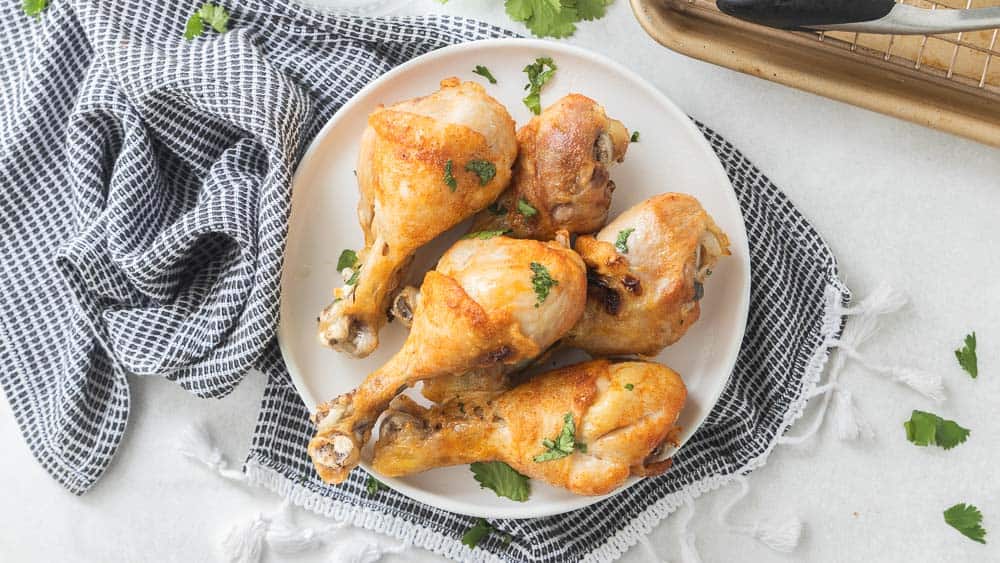 broiled chicken drumsticks on a plate