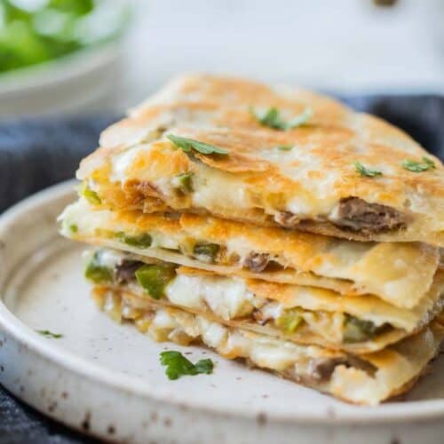 quesadilla wedges stacked on plate