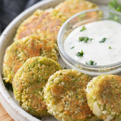 veggie nuggets displayed on plate with sauce in center