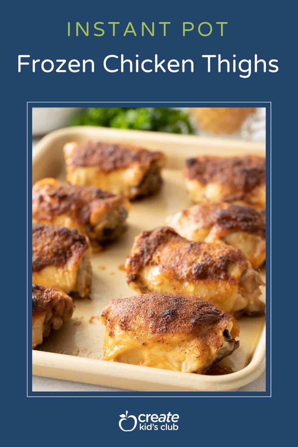 pin of crispy chicken thighs on a baking tray