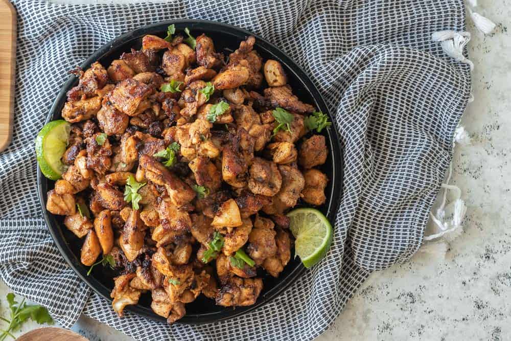 top down view of qdoba chicken on a platter