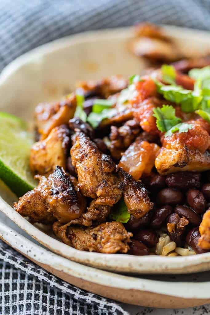 qdoba chicken in bowl with rice and beans
