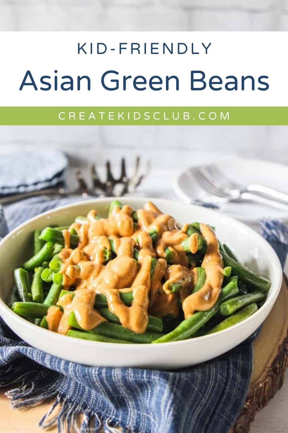 a pin of green beans with a peanut satay sauce
