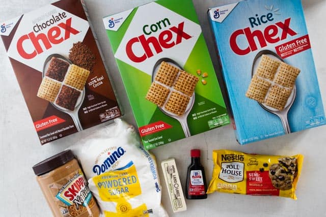 chex cereal, peanut butter, powdered sugar, butter, vanilla and chocolate chips displayed 