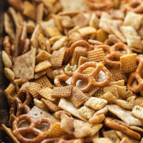 close up of gluten free Chex mix in a roasting pan