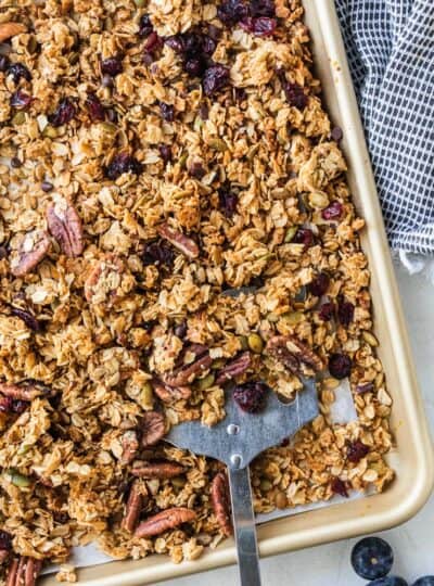 spatula scooping up homemade granola