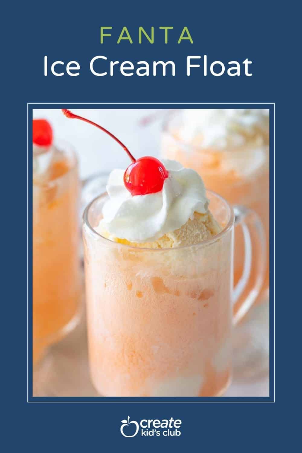 a fanta ice cream float in a glass with whipped cream and a cherry on top