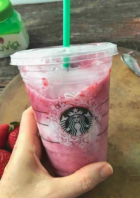 A copycat Starbucks pink drink in a Starbucks cup