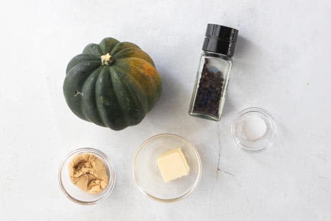 acorn squash, cinnamon, sugar and butter displayed