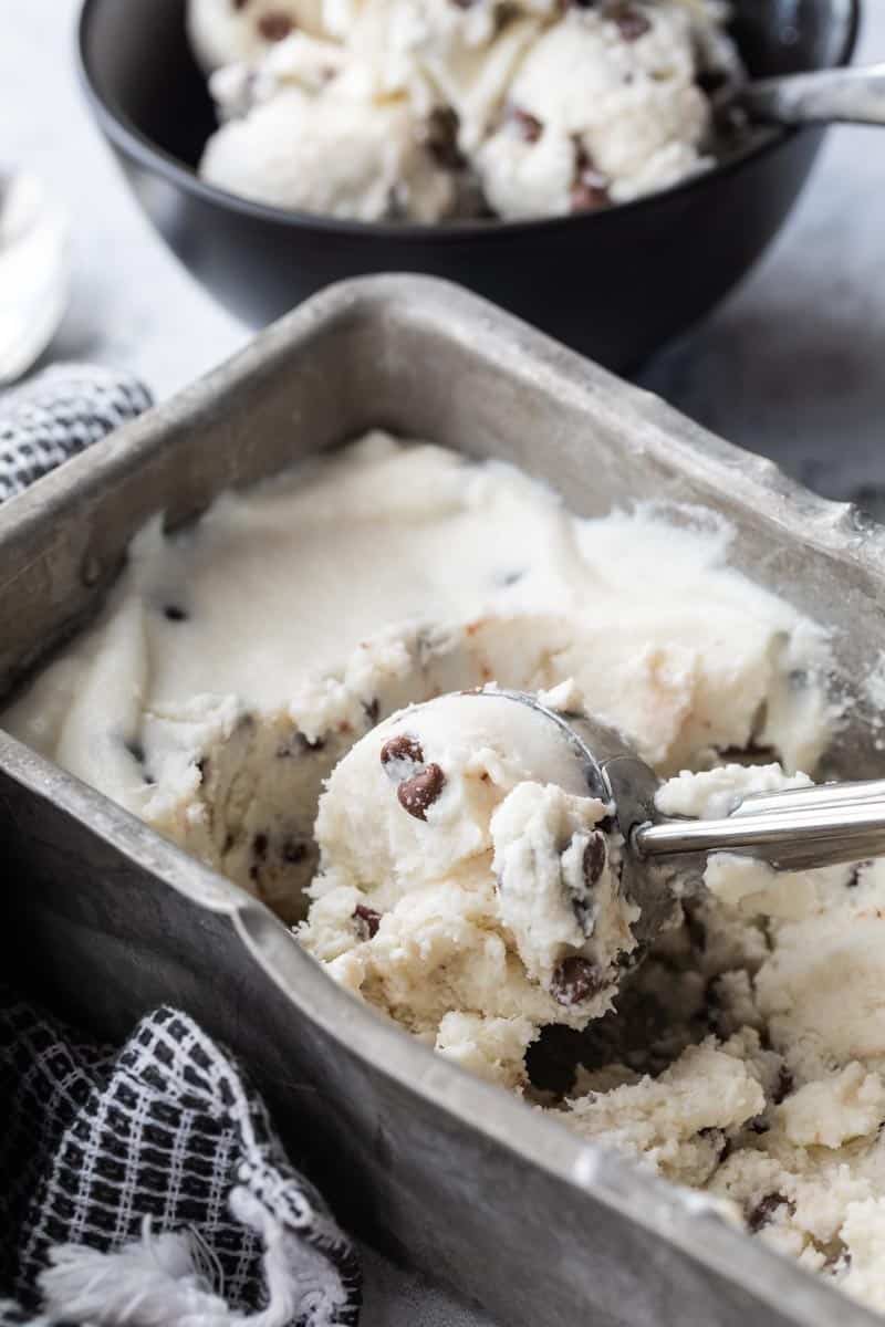 ice cream scoop scooping ice cream from loaf pan