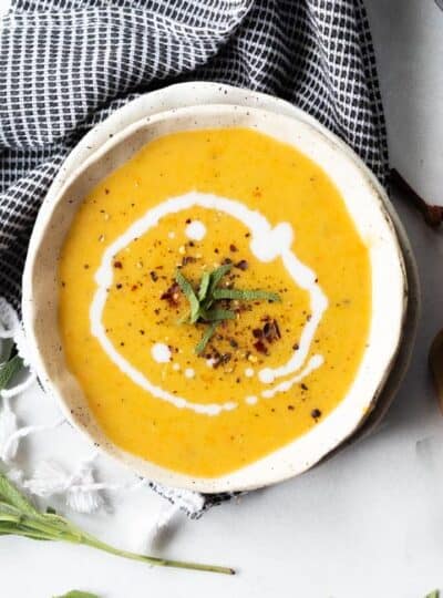 top down shot of creamy squash soup in bowl