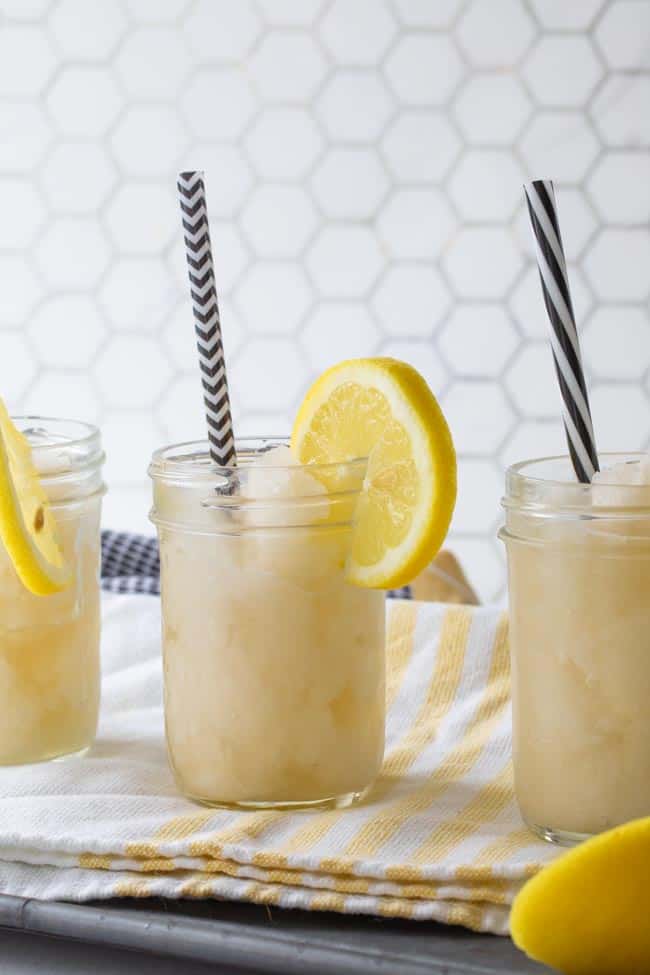 frozen lemonade in jars with straws