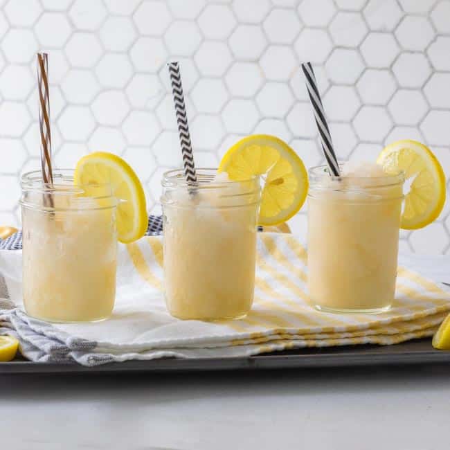 frozen lemonade in jars with straws