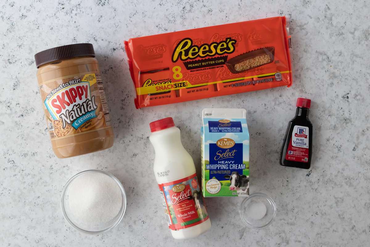 peanut butter, Reese's peanut butter cups, milk, sugar, vanilla extract, salt and whipping cream displayed