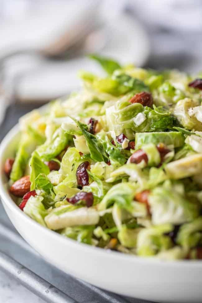 shredded brussels sprout salad in a large bowl