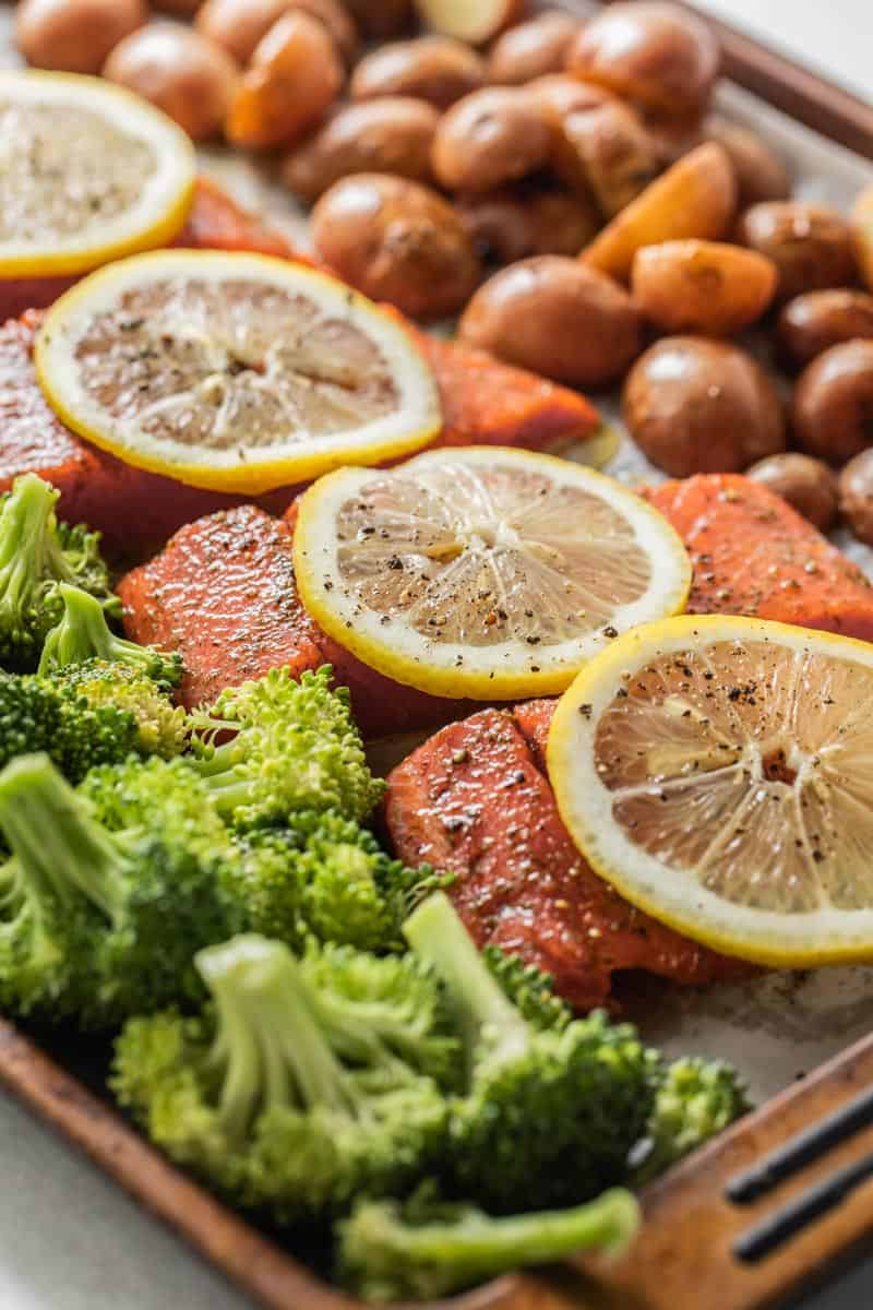 broccoli, salmon and red potatoes on a sheet pan