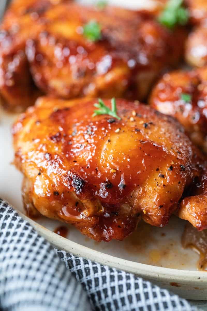 bbq boneless chicken thighs on a plate