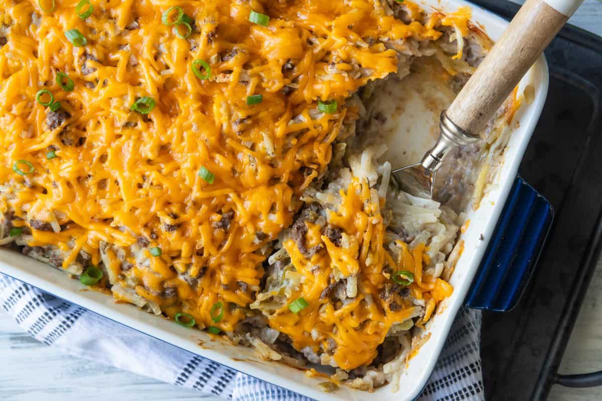 top down view of spoon in hamburger hashbrown casserole