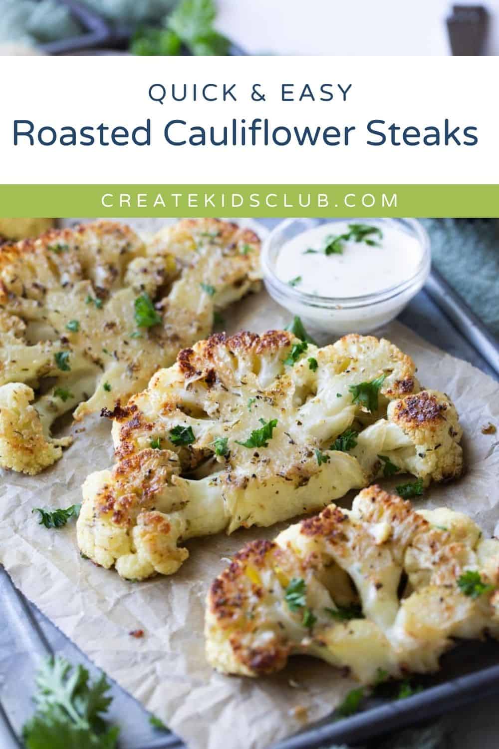 pin of roasted cauliflower steaks on a tray