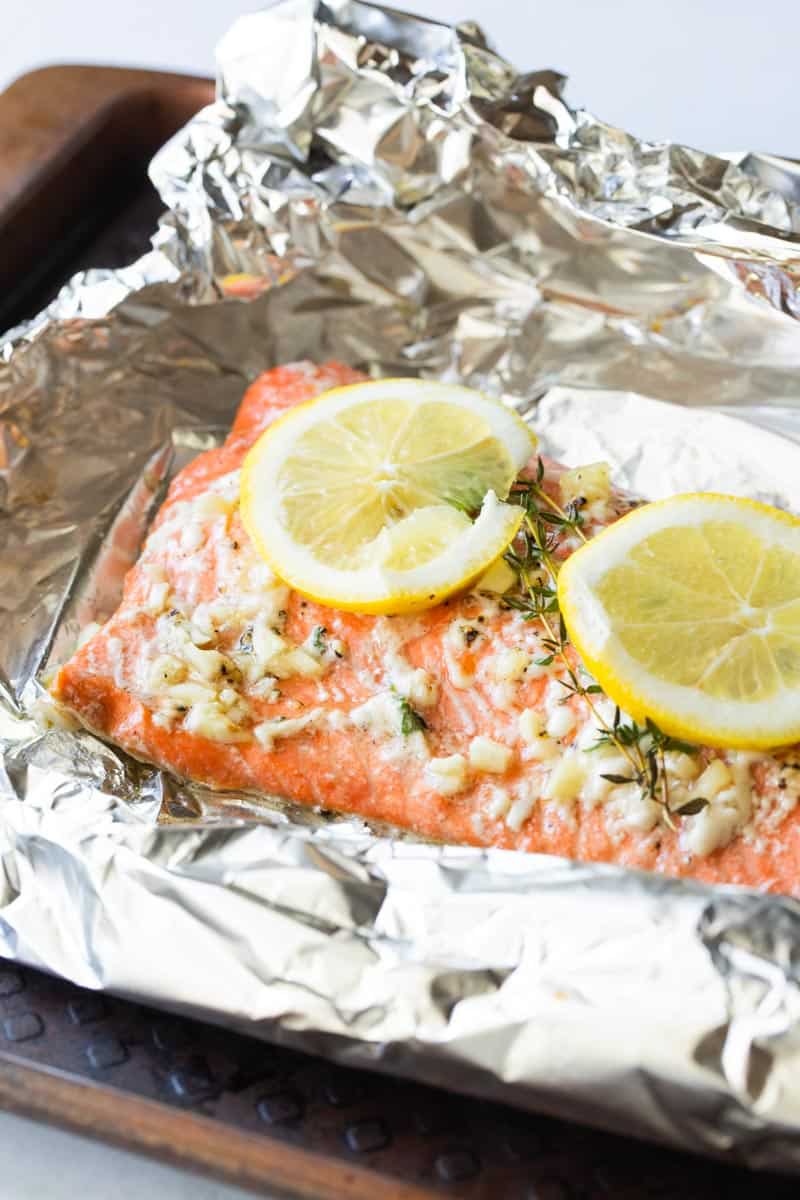 close up of baked salmon fillet on foil