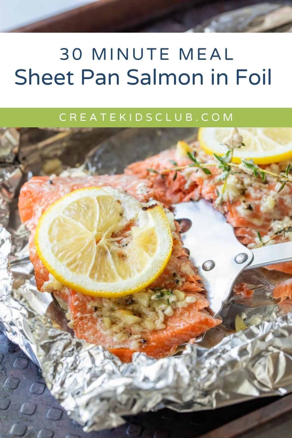 pin of salmon baked in foil with lemon