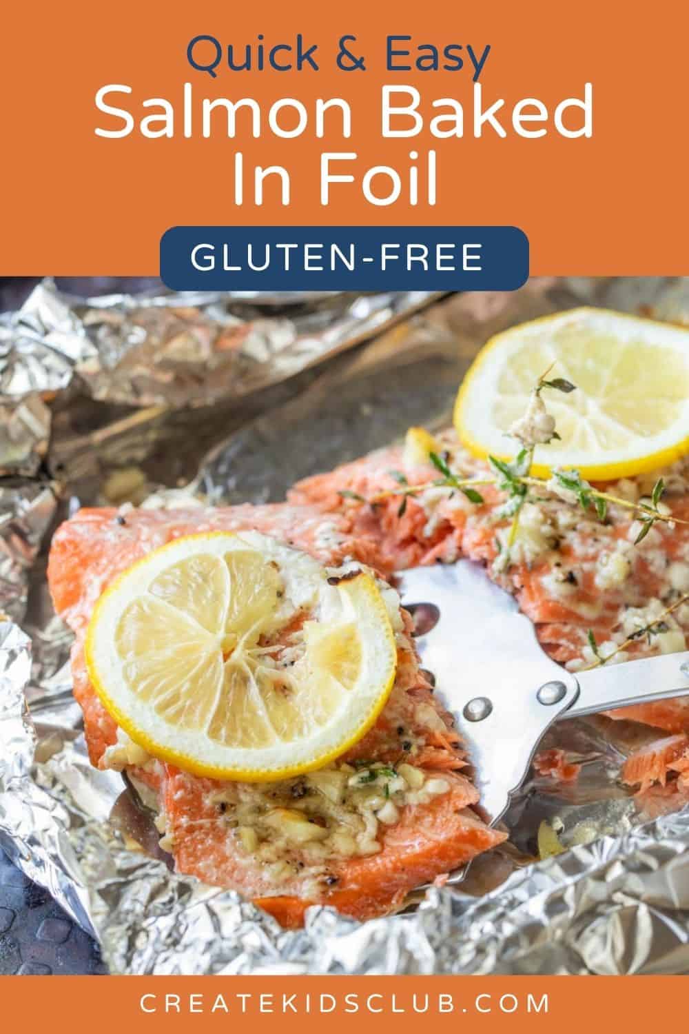 pin of salmon baked in foil with lemon