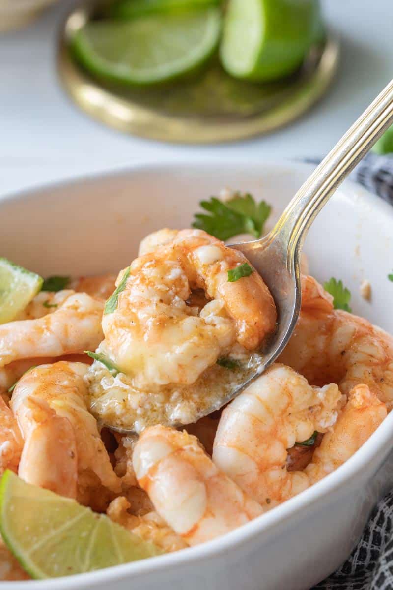 spoon scooping shrimp from bowl