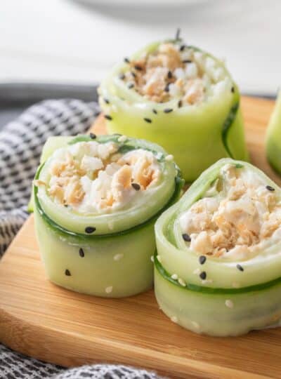 cucumber sushi rolls on cutting board