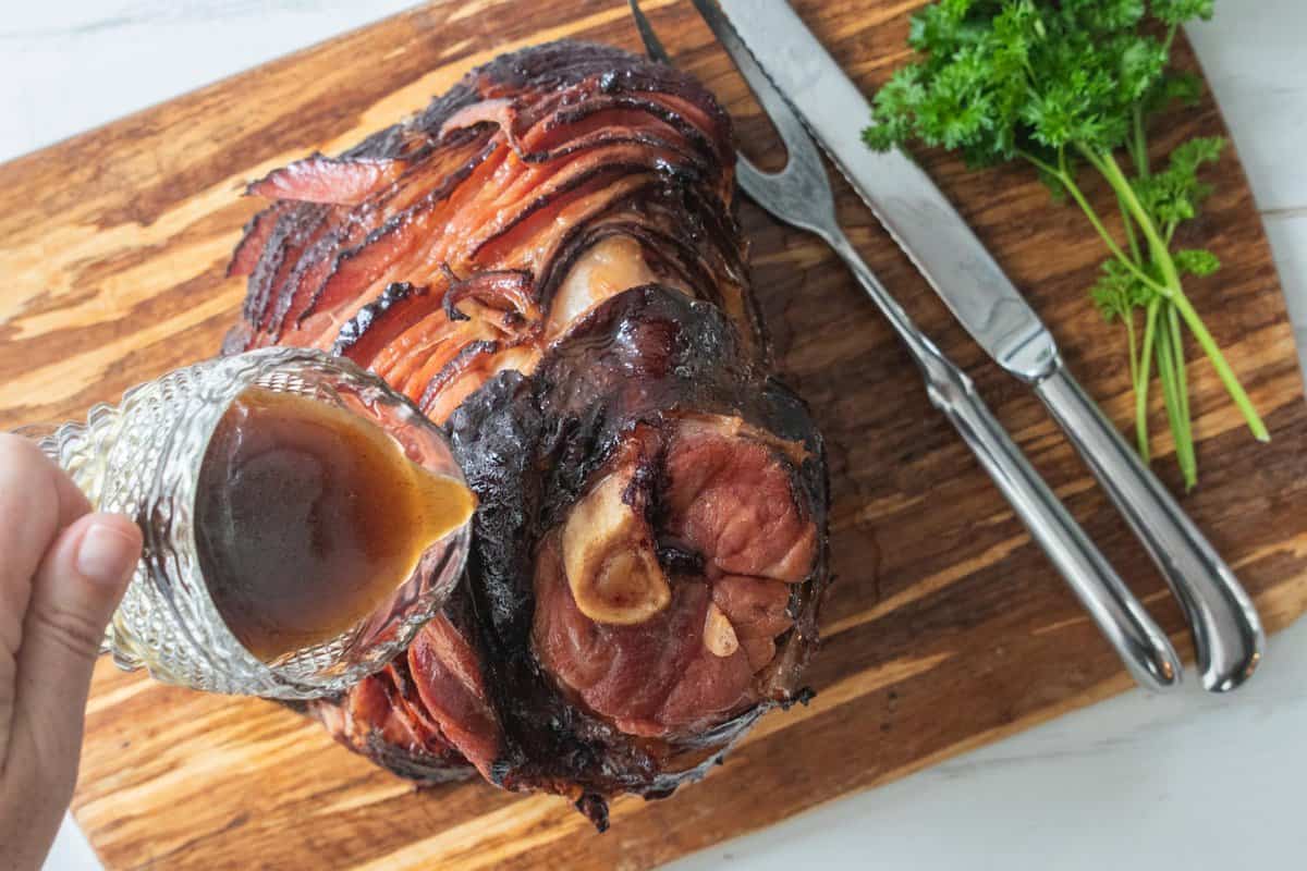 pineapple glaze poured on top of spiral ham