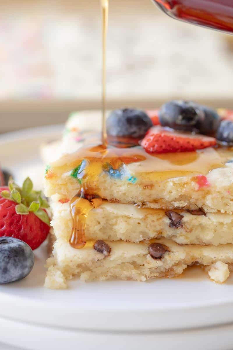 stack of pancake slices drizzled with syrup